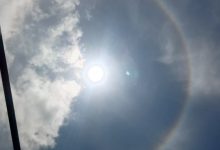 Fenomena halo matahari terlihat mengelilingi matahari di langit Sampang, Jumat (3/4/2026) siang.