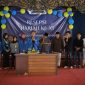 Prosesi pemotongan tumpeng dalam resepsi Harlah ke-XI PMII Rayon Sunan Cendana Komisariat STKIP PGRI Bangkalan yang berlangsung penuh khidmat dan semangat kekeluargaan.