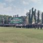 Ratusan peserta mengikuti upacara pembukaan Bakti TNI AD Tahun 2026 di Alun-Alun Bangkalan, Senin (6/7/2026). Program ini menyasar pembangunan infrastruktur, layanan kesehatan, bantuan sosial, dan pemberdayaan masyarakat di Pulau Madura.